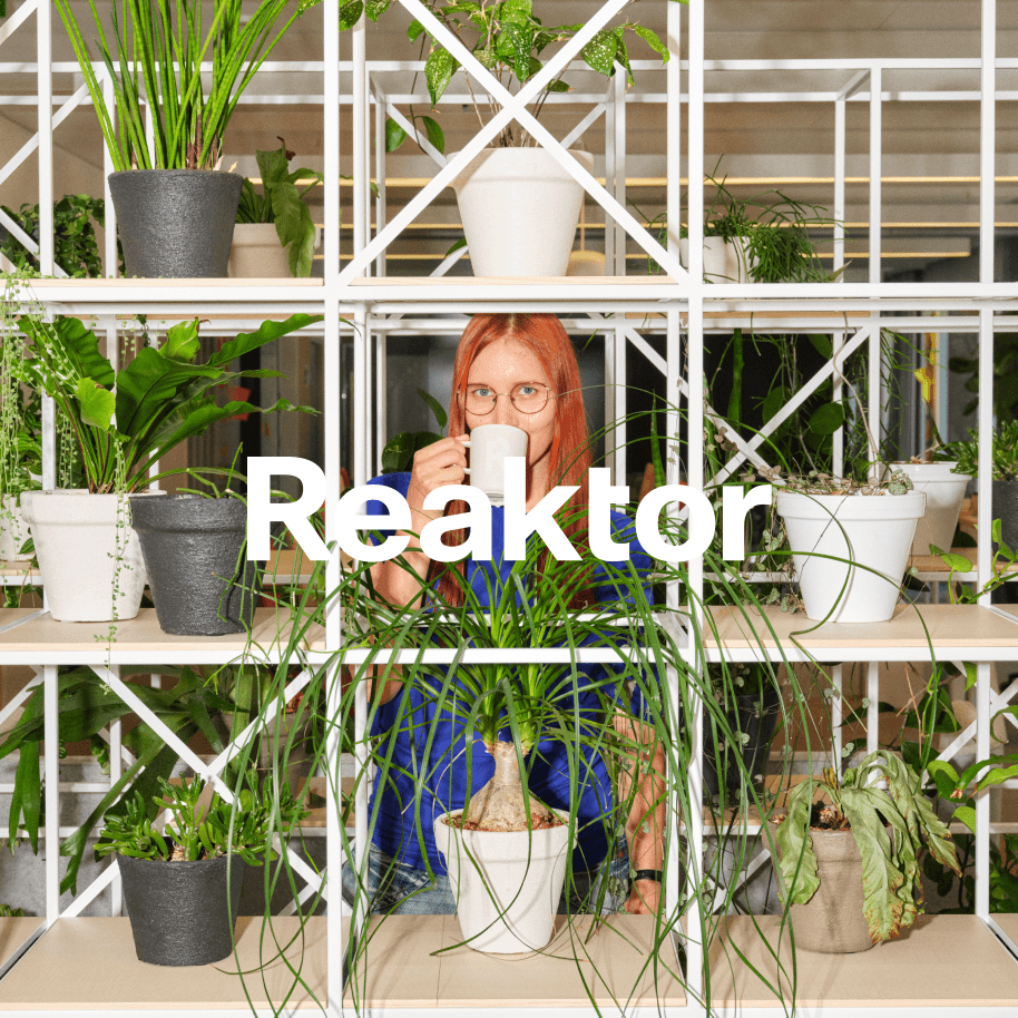 Reaktor logo on top of an image with many plants and a person drinking from a cup.